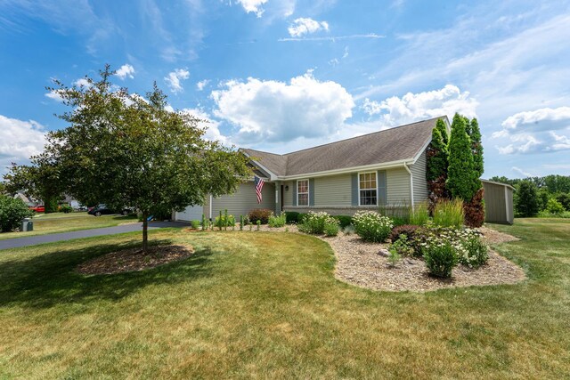 2030 Southfield Ln, Byron, IL 61010 - ranch-style house with a garage, a front lawn, roof with shingles, and driveway