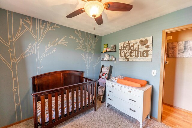2030 Southfield Ln, Byron, IL 61010 - bedroom with a nursery area and ceiling fan