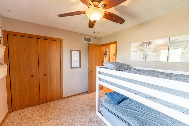 2030 Southfield Ln, Byron, IL 61010 - bedroom with light carpet, a closet, and a ceiling fan