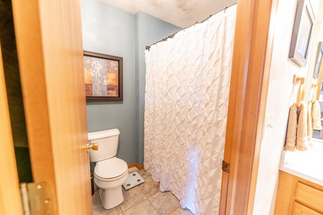 2030 Southfield Ln, Byron, IL 61010 - full bathroom featuring tile patterned floors and a shower with curtain