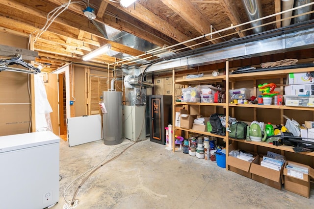 2030 Southfield Ln, Byron, IL 61010 - unfinished basement with water heater, fridge, and heating unit