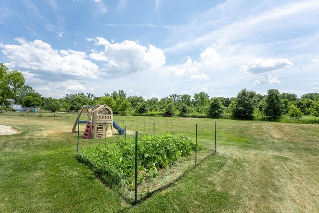 2030 Southfield Ln, Byron, IL 61010 - view of yard featuring a vegetable garden and a rural view