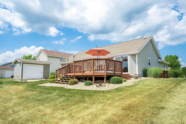 2030 Southfield Ln, Byron, IL 61010 - back of house with an outbuilding, a deck, a yard, and a detached garage