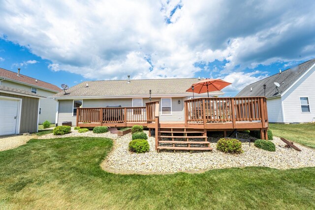 2030 Southfield Ln, Byron, IL 61010 - rear view of house featuring a wooden deck and a lawn