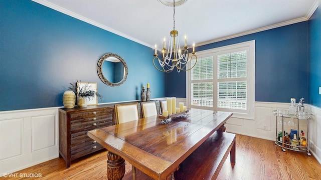 0N488 Baker Dr, Geneva, IL 60134 - dining room featuring a chandelier, a wainscoted wall, crown molding, wood finished floors, and a decorative wall