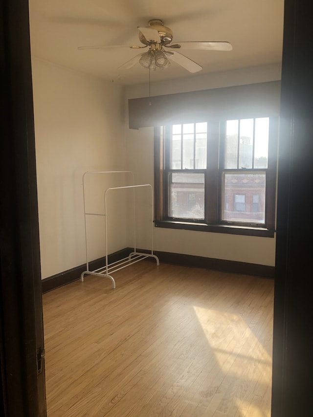 2244 W Augusta Blvd, Chicago, IL 60622 - spare room with ceiling fan and wood finished floors
