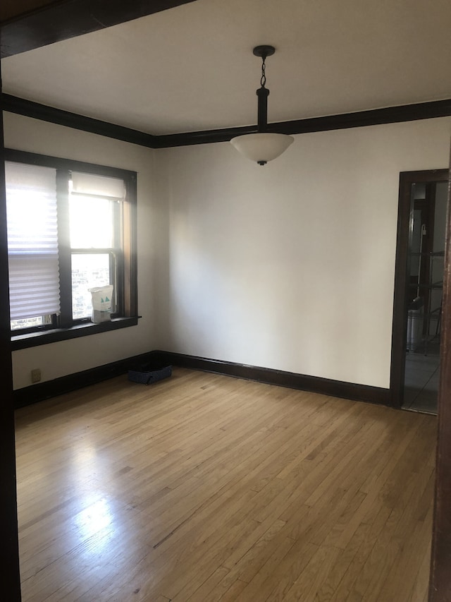 2244 W Augusta Blvd, Chicago, IL 60622 - unfurnished room with hardwood / wood-style flooring and crown molding