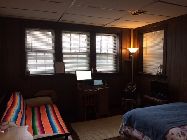2244 W Augusta Blvd, Chicago, IL 60622 - bedroom with wooden walls and a paneled ceiling