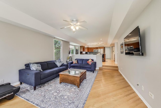 2114 Birchwood Ln, Buffalo Grove, IL 60089 - living area with a ceiling fan and light wood finished floors