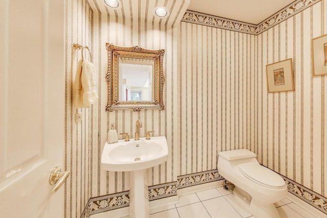 2114 Birchwood Ln, Buffalo Grove, IL 60089 - half bath featuring tile patterned floors and toilet