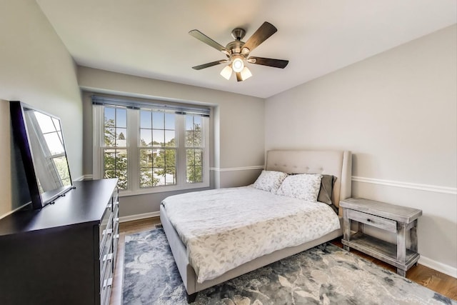 2114 Birchwood Ln, Buffalo Grove, IL 60089 - bedroom featuring wood finished floors and ceiling fan