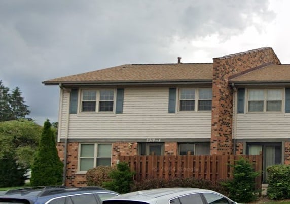 7318 Winthrop Way Unit 4, Downers Grove, IL 60516 - view of front of house with brick siding