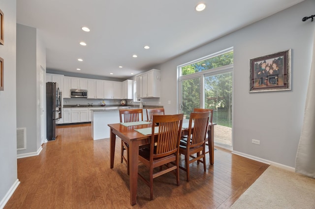 1616 Sutton Pl, Bolingbrook, IL 60490 - dining area with recessed lighting and wood finished floors