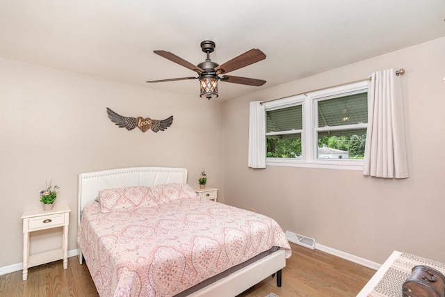 9049 Barberry Ln, Hickory Hills, IL 60457 - bedroom featuring wood finished floors and a ceiling fan