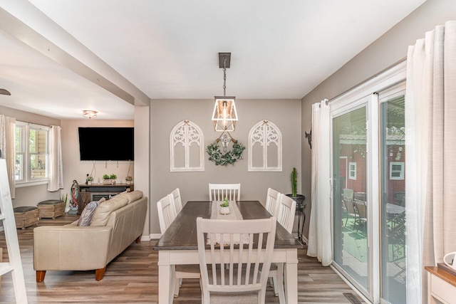 9049 Barberry Ln, Hickory Hills, IL 60457 - dining space with light wood-type flooring and a fireplace