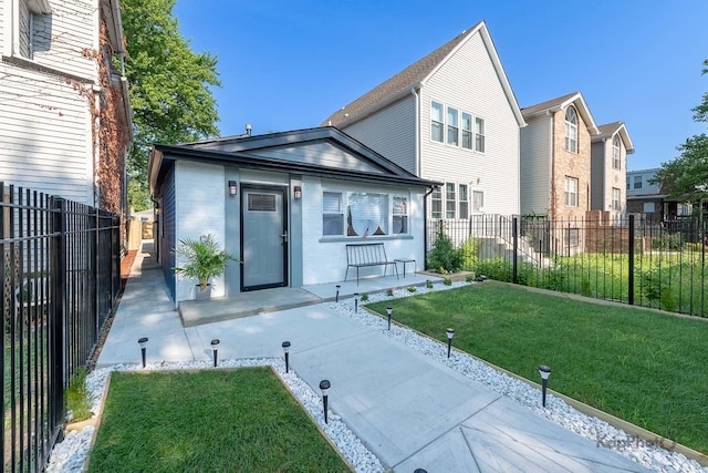 9130 S Greenwood Ave, Chicago, IL 60619 - rear view of property featuring a fenced backyard