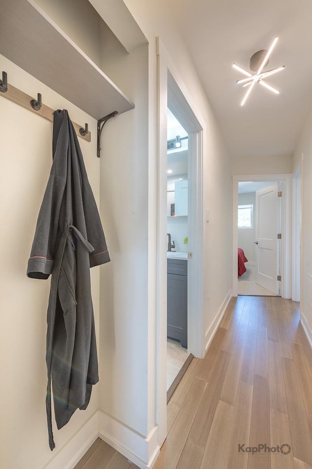 9130 S Greenwood Ave, Chicago, IL 60619 - hallway featuring light wood finished floors and baseboards