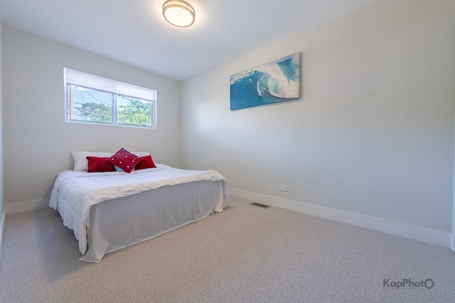 9130 S Greenwood Ave, Chicago, IL 60619 - bedroom featuring light carpet and baseboards