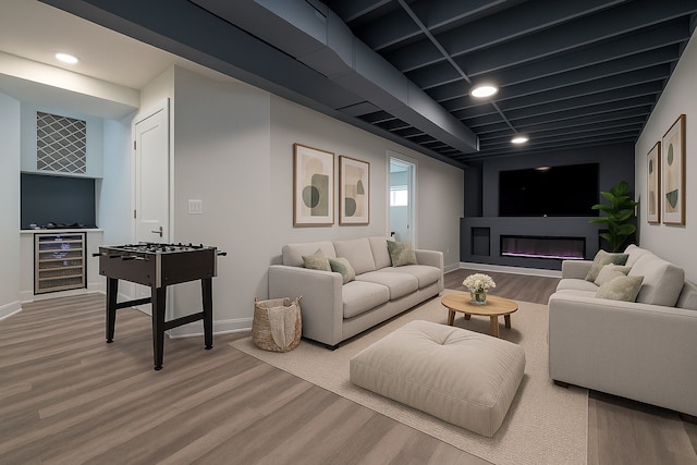 9130 S Greenwood Ave, Chicago, IL 60619 - living room with beverage cooler, wood finished floors, and recessed lighting