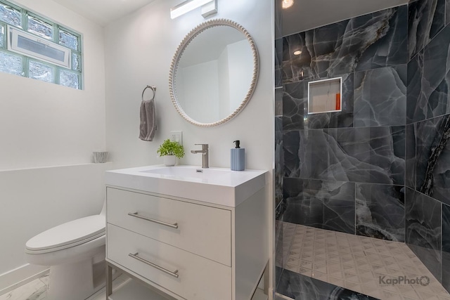 9130 S Greenwood Ave, Chicago, IL 60619 - full bath featuring marble look tile flooring, vanity, and a marble finish shower