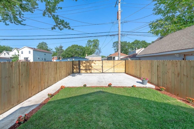 9130 S Greenwood Ave, Chicago, IL 60619 - fenced backyard featuring a patio area