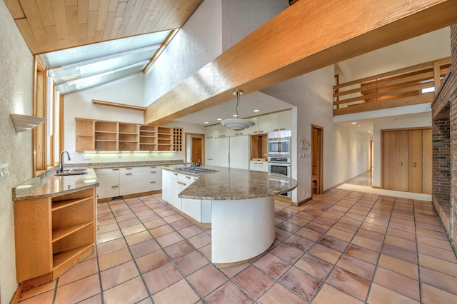 8170 Lake Ridge Dr, Burr Ridge, IL 60527 - kitchen with open shelves, high vaulted ceiling, white cabinetry, light tile patterned floors, and a textured wall