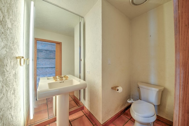 8170 Lake Ridge Dr, Burr Ridge, IL 60527 - bathroom with toilet and tile patterned floors