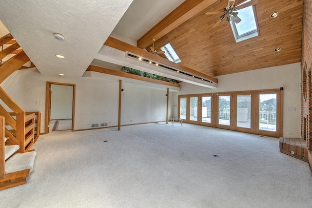 8170 Lake Ridge Dr, Burr Ridge, IL 60527 - unfurnished living room featuring a skylight, carpet, stairway, high vaulted ceiling, and recessed lighting