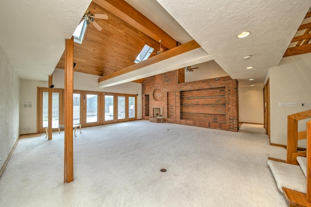 8170 Lake Ridge Dr, Burr Ridge, IL 60527 - unfurnished living room featuring carpet flooring, beam ceiling, french doors, ceiling fan, and high vaulted ceiling