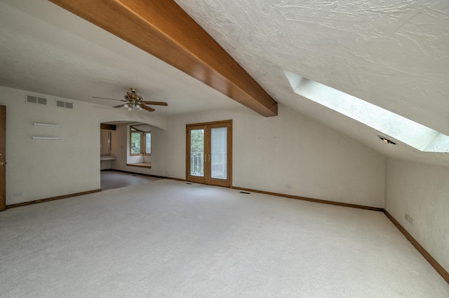 8170 Lake Ridge Dr, Burr Ridge, IL 60527 - bonus room featuring a skylight, carpet floors, a textured ceiling, ceiling fan, and lofted ceiling