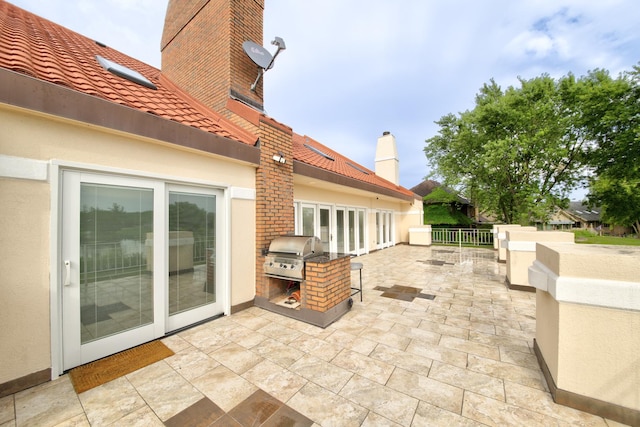 8170 Lake Ridge Dr, Burr Ridge, IL 60527 - view of patio / terrace featuring an outdoor kitchen and french doors