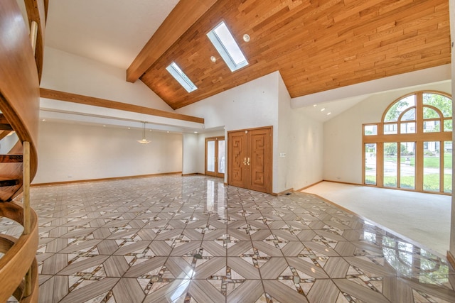 8170 Lake Ridge Dr, Burr Ridge, IL 60527 - unfurnished living room with high vaulted ceiling, beamed ceiling, and a skylight