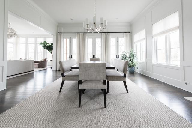 15W170 60th St, Burr Ridge, IL 60527 - dining space featuring a chandelier, dark wood finished floors, and ornamental molding
