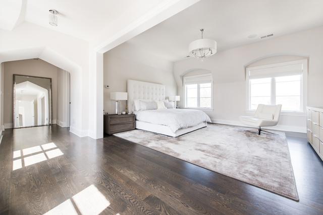 15W170 60th St, Burr Ridge, IL 60527 - bedroom featuring wood finished floors, lofted ceiling, and a chandelier