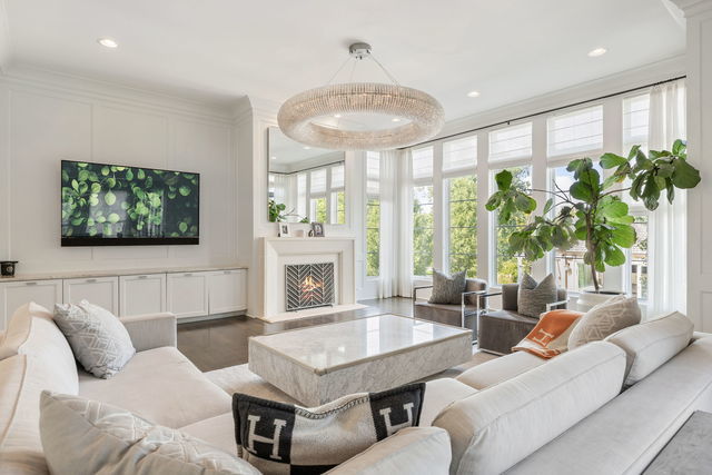 15W170 60th St, Burr Ridge, IL 60527 - living room with a decorative wall, plenty of natural light, ornamental molding, recessed lighting, and a fireplace with flush hearth