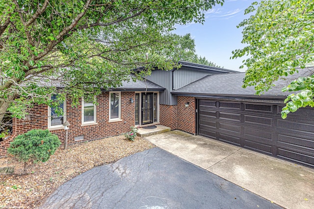 6414 180th St, Tinley Park, IL 60477 - view of front of house featuring driveway, a shingled roof, an attached garage, and brick siding