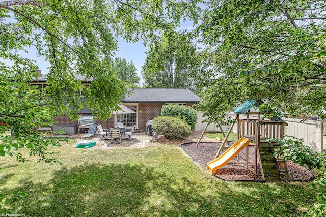 6414 180th St, Tinley Park, IL 60477 - view of yard with a playground and a patio