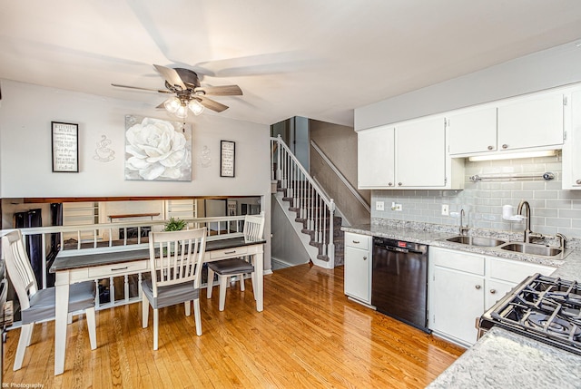 6414 180th St, Tinley Park, IL 60477 - kitchen with dishwashing machine, ceiling fan, light wood-style floors, decorative backsplash, and white cabinetry