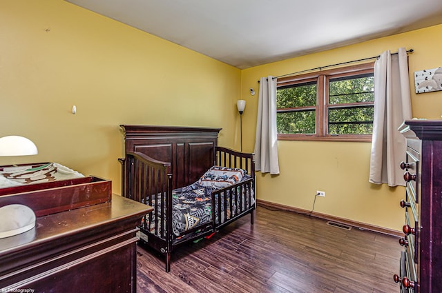 6414 180th St, Tinley Park, IL 60477 - bedroom with dark wood-style floors and baseboards