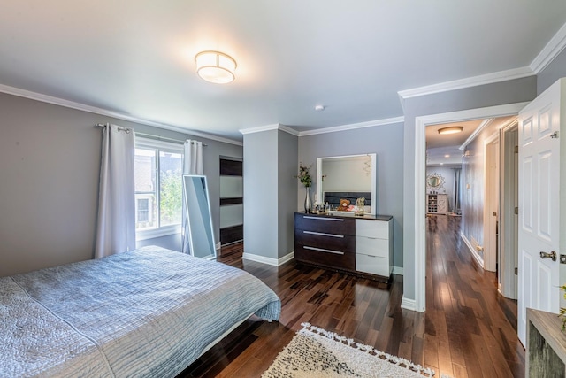 484 Valleyview Dr, Bartlett, IL 60103 - bedroom with ornamental molding and dark wood-style flooring