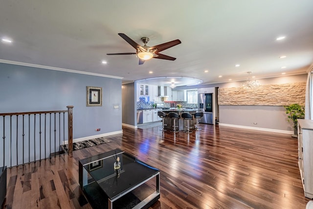 484 Valleyview Dr, Bartlett, IL 60103 - living area with ornamental molding, ceiling fan, recessed lighting, dark wood-type flooring, and a chandelier
