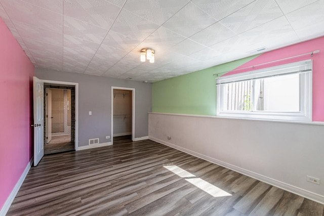 484 Valleyview Dr, Bartlett, IL 60103 - unfurnished bedroom with wood finished floors and a closet