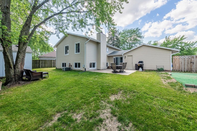 484 Valleyview Dr, Bartlett, IL 60103 - rear view of property with a chimney and a patio