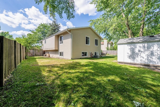 484 Valleyview Dr, Bartlett, IL 60103 - rear view of property featuring a fenced backyard and an outdoor structure