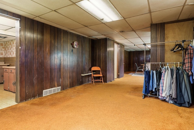 6650 Happy Acres Rd, Rockford, IL 61101 - interior space with carpet, wooden walls, and a paneled ceiling