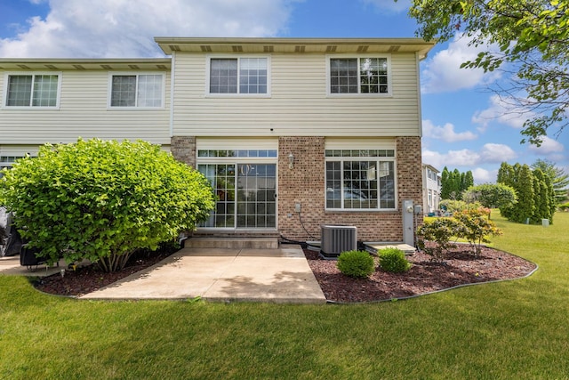 18422 Century Ct, Tinley Park, IL 60477 - rear view of house with a yard, brick siding, and a patio
