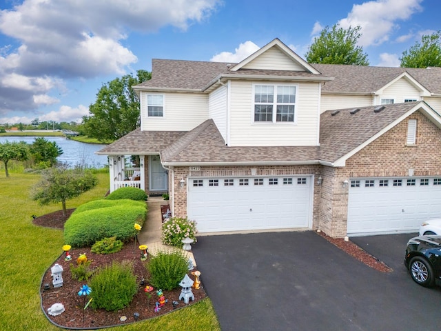 18422 Century Ct, Tinley Park, IL 60477 - traditional-style home with asphalt driveway, brick siding, and a shingled roof