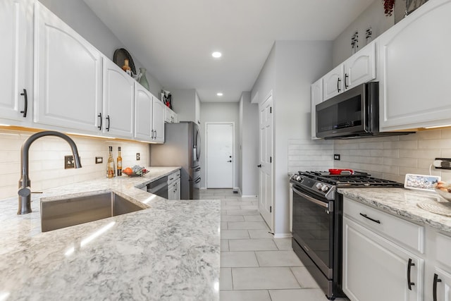 18422 Century Ct, Tinley Park, IL 60477 - kitchen with stainless steel appliances, light tile patterned floors, light stone counters, recessed lighting, and decorative backsplash