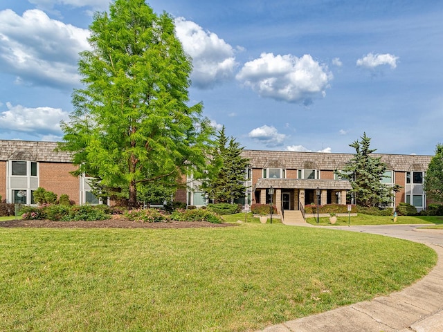2300 Windsor Mall Unit 2G, Park Ridge, IL 60068 - multi unit property with brick siding, a front yard, and mansard roof