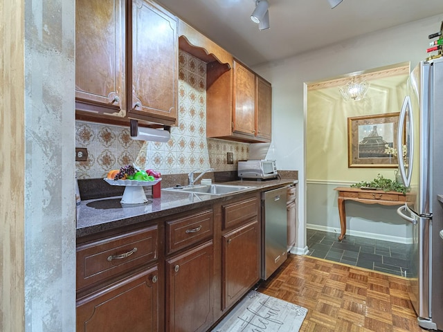 2300 Windsor Mall Unit 2G, Park Ridge, IL 60068 - kitchen with stainless steel appliances, tasteful backsplash, and dark stone counters